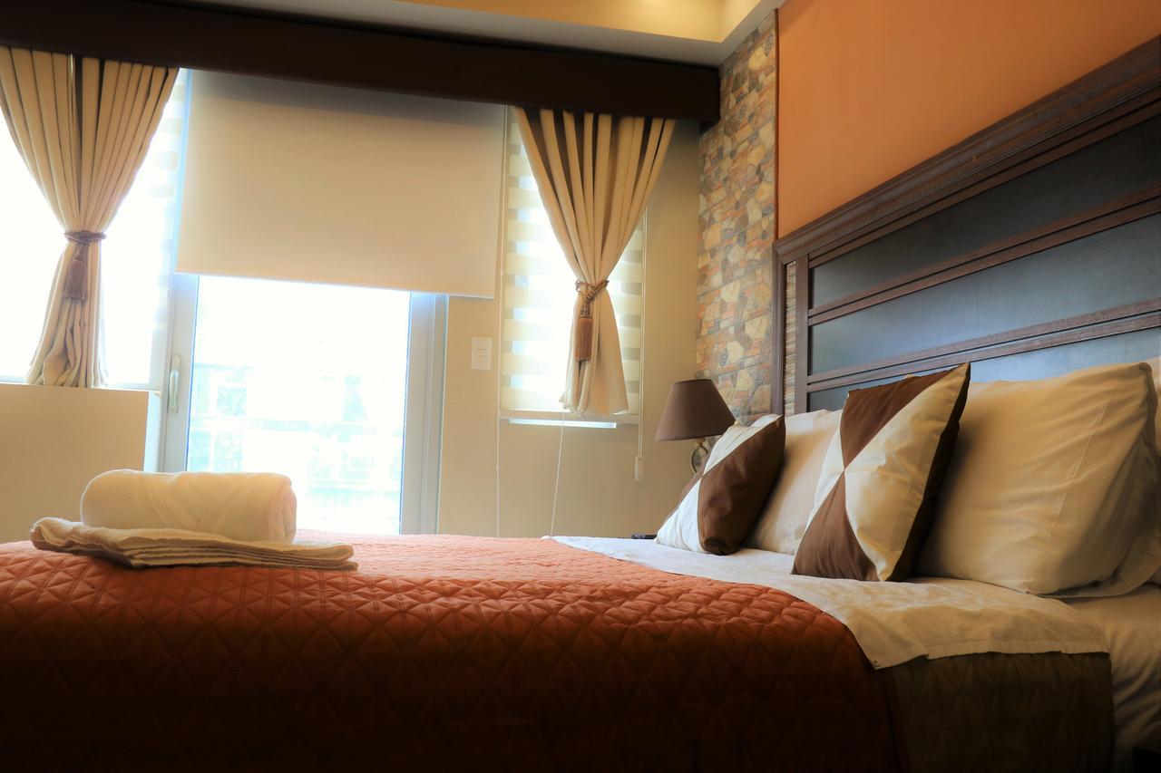 One Palm Tree Villas มะนิลา ภายนอก รูปภาพ